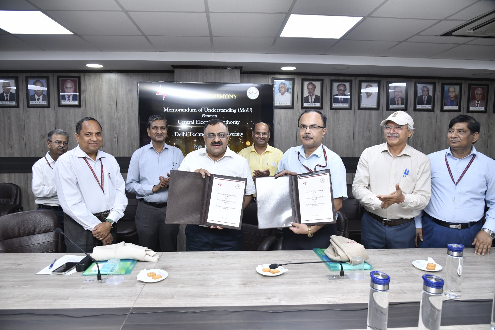 Newspaper clipping of MoU between CEA and NCEET, DTU